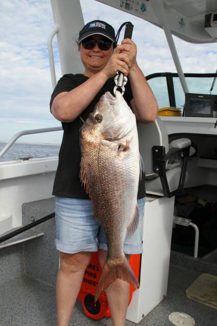 DAYBREAK CATCH: Tracey Sweetman from Largs with her nine kilogram snapper caught on daybreak around Cod Rock. Picture: supplied.