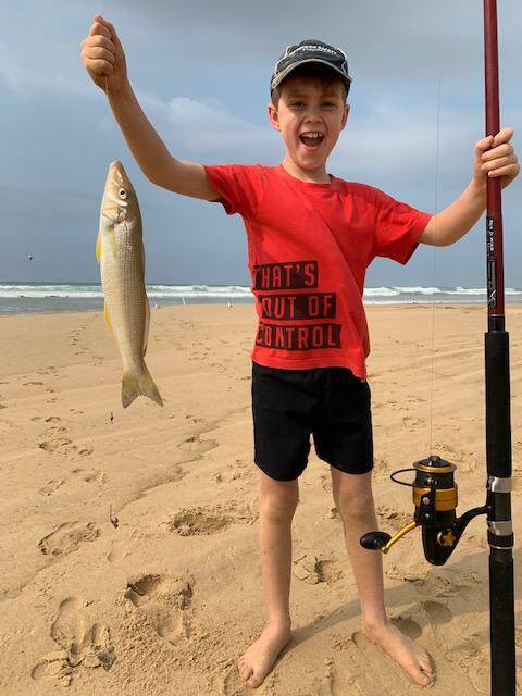 REEL FUN: Nine-year-old Joshua Abbott from Corlette lands in his first whiting off Birubi Beach as whiting arrive just in time for the summer holidays. Picture: supplied.