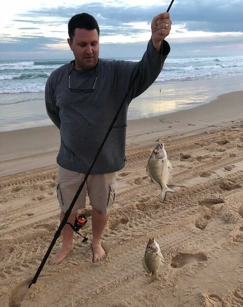 Corlette champion Ben Abbott scored a double header on his paternoster rig with a methylated spirit treated worm for bait on Stockton Beach. Photo supplied.