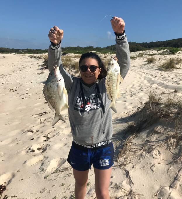 FISHING DELIGHTS: Sydney visitor Laura Vella lands herself a couple of cracker Fingal bream. Picture: supplied. 