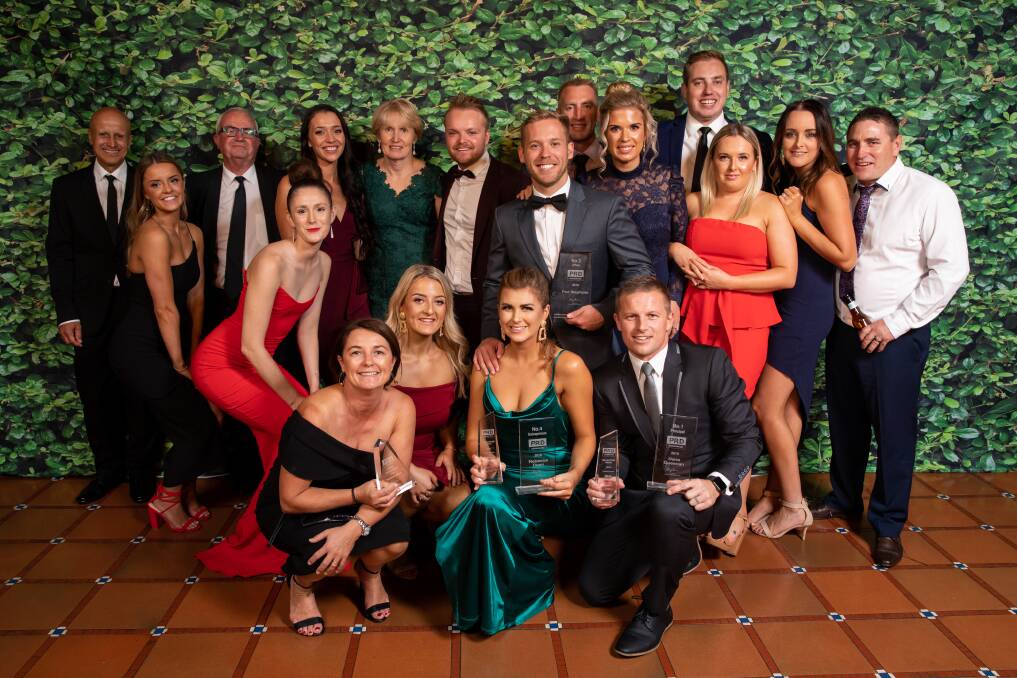 Team: The PRD Nationwide Port Stephens staff celebrate at the recent annual awards, where they scooped several awards for achievements in 2018.