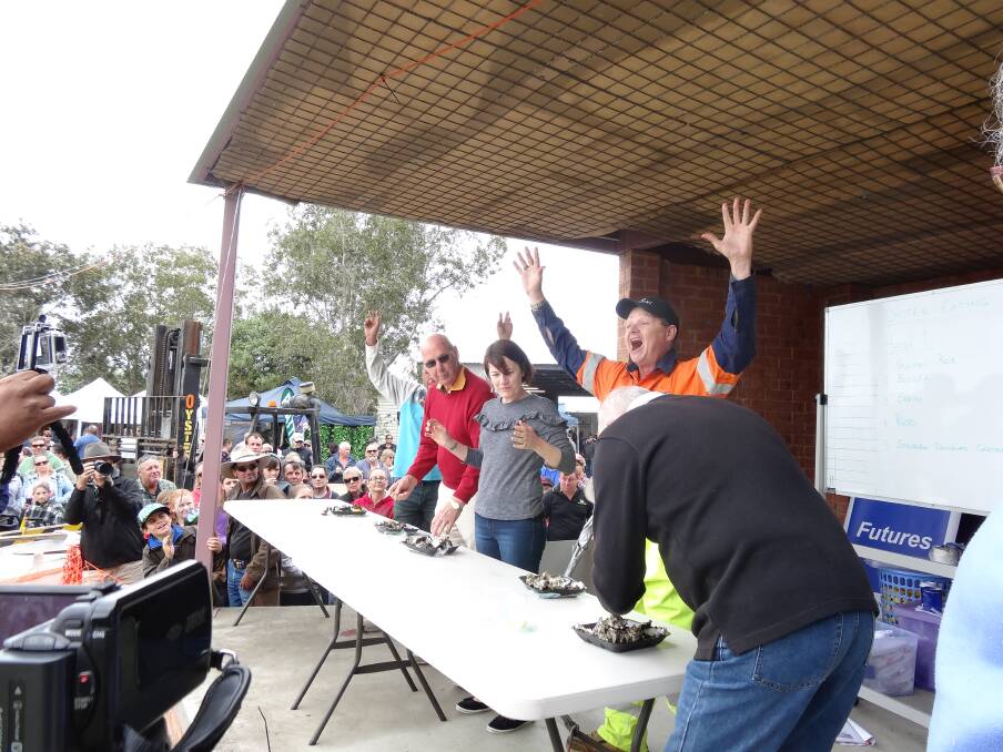 Shuckingly quick: Last year's oyster eating competition at the Karuah Oyster and Timber festival will run again on October 20.