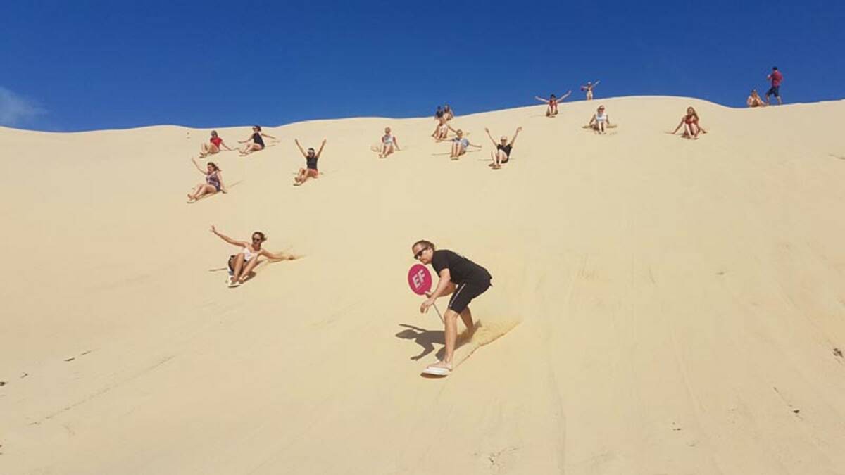 FAMILY FUN: Try your hand at sand boarding, it's a great experience for all ages.