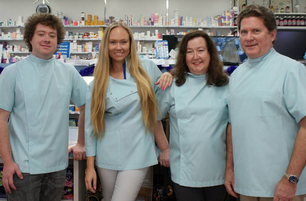 Family values: Gavin (far right), Margaret-Anne and children Maddie and David have all been part of the team at Medowie Pharmacy.