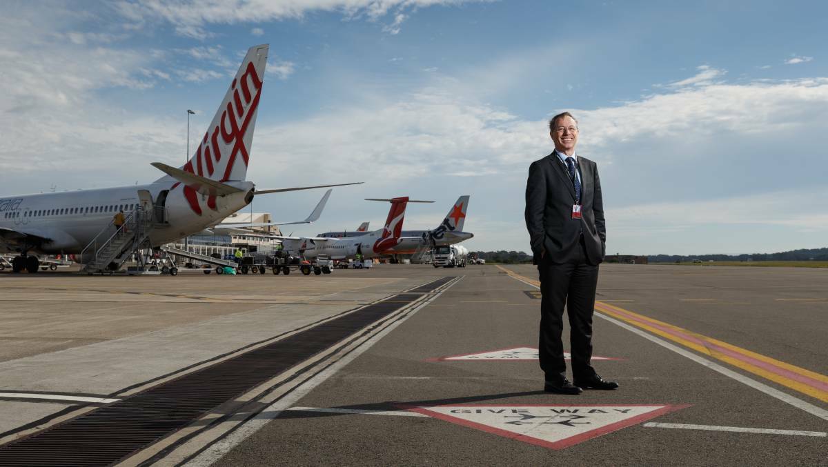 GRATEFUL: Newcastle Airport CEO Dr Peter Cock. Picture: Max Mason-Hubers