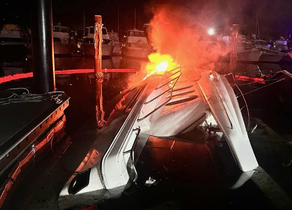 Scenes from the complex salvage operation after a luxury yacht was destroyed by fire at Nelson Bay on March 25. Picture supplied / Fire & Rescue NSW
