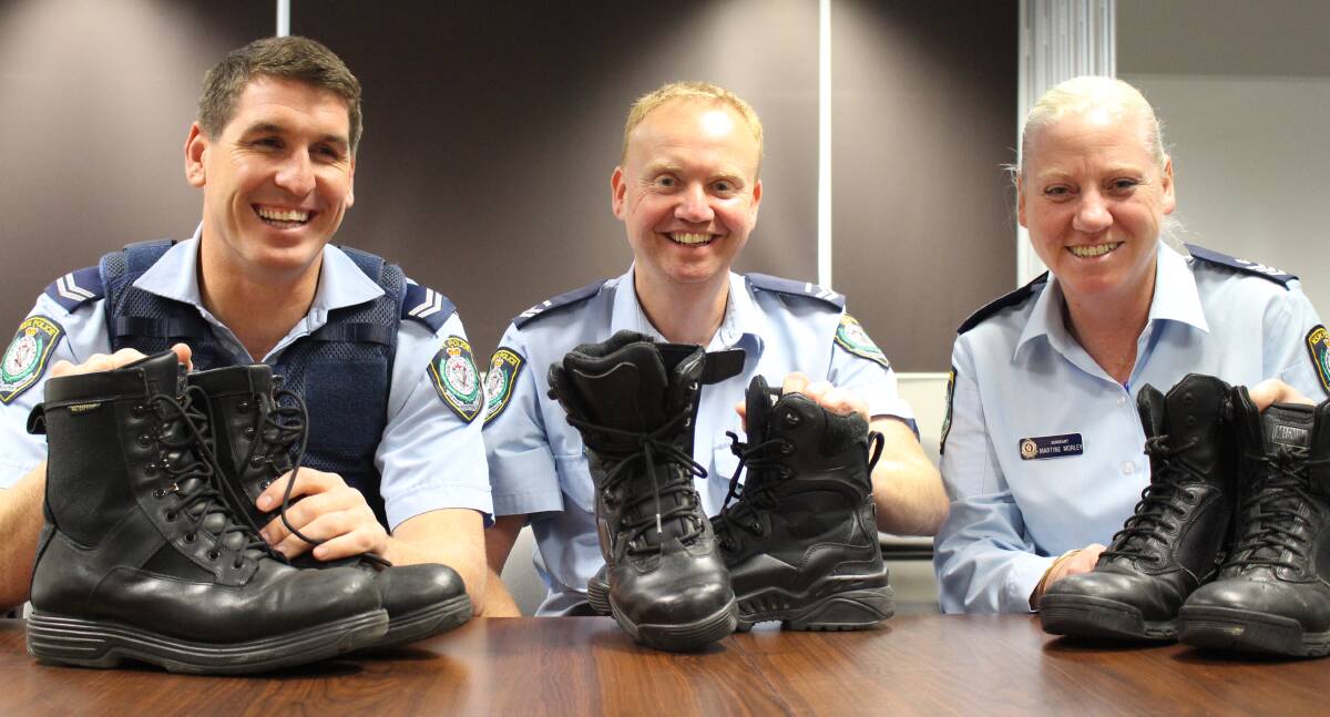 SHOES FOR ALL: Port Stephens senior constables Kane Goodchild and Gary Oliver with Sergeant Martine Morley. Picture: Ellie-Marie Watts