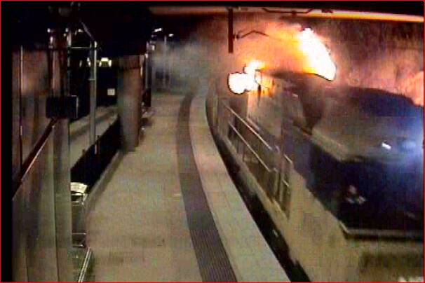 Emergency: Security cameras at Cardiff railway station capture the start of a locomotive fire in a Pacific National freight train caused by two fatigued and fractured bolts.