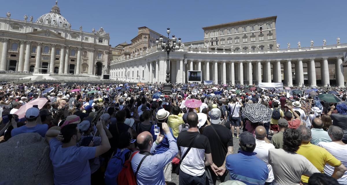 The faithful, and tourists: The Vatican this week as Pope Francis speaks.