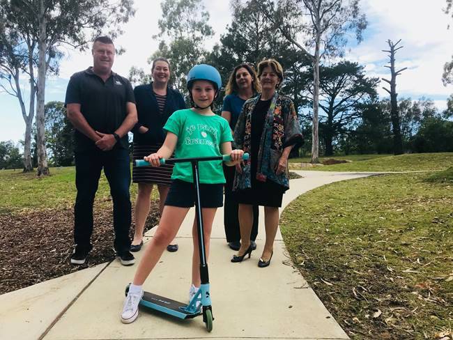Anna Johnson, 11, with (from left) Port Stephens Council’s facilities and services manager Greg Kable, councillor and Liberal candidate Jaimie Abbott, Port Stephens Deputy Mayor Sarah Smith and Port Stephens Duty MLC Catherine Cusack in Boomerang Park.