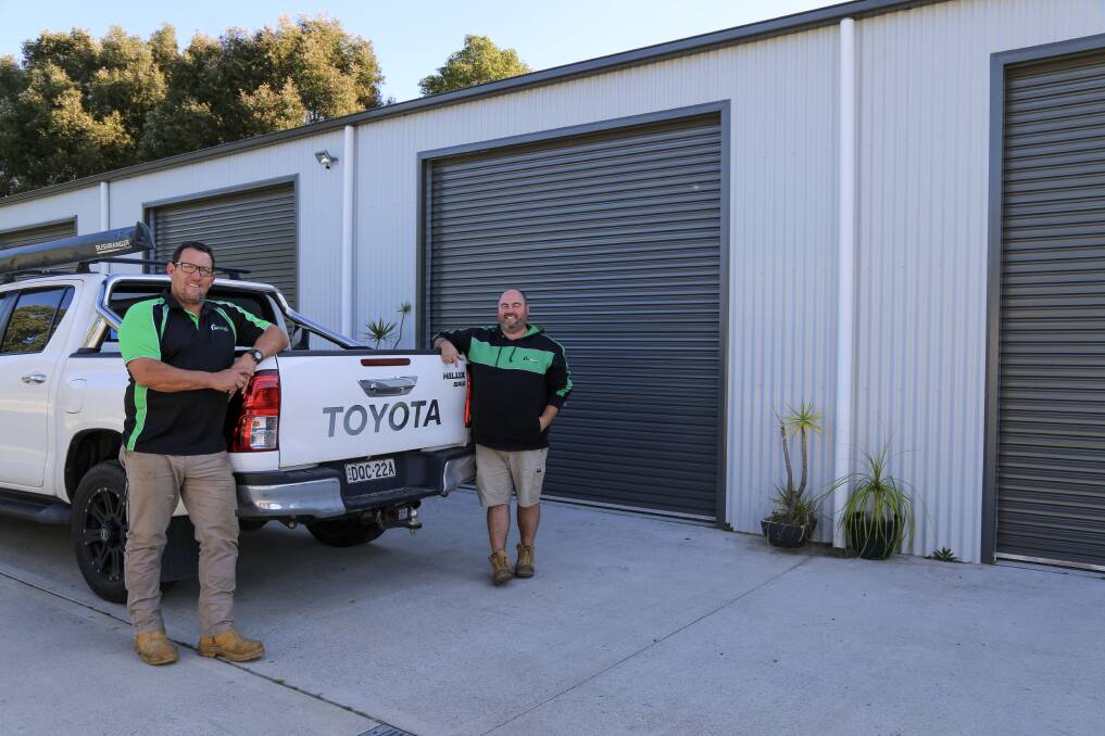 SUPPORT LOCAL: Port Hunter Sheds and Garages director Tim Spencer with managing director Nathan Whitten at the Bobs Farm-based business. Picture: Ellie-Marie Watts