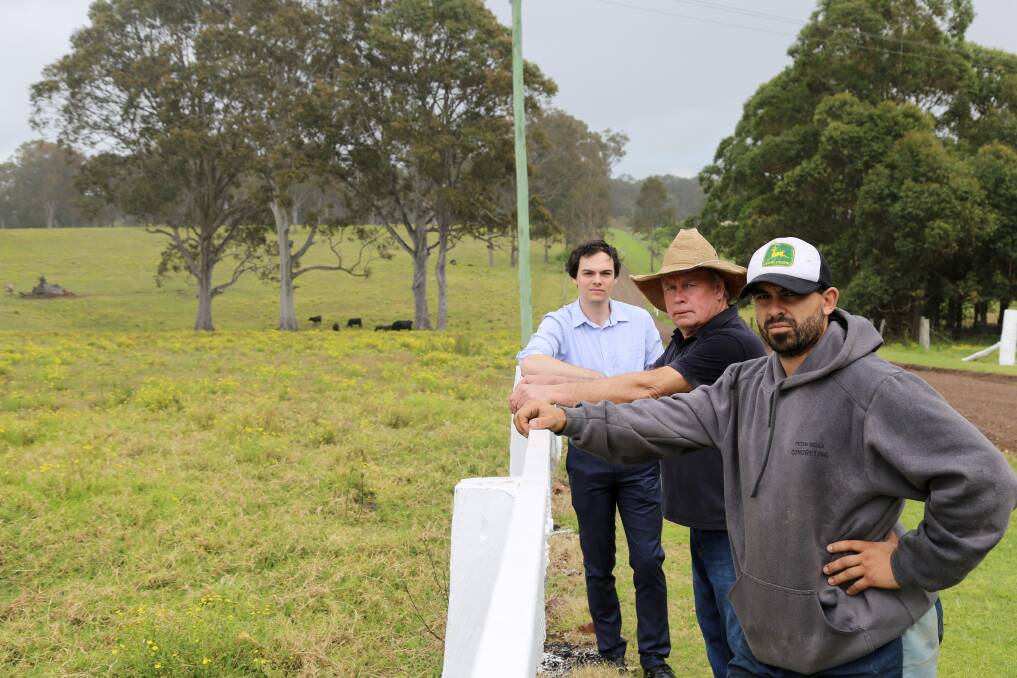 NOT SUITABLE: Cr Giacomo Arnott with Nelsons Plains farmers Peter Manuel and Peter Bartolo at the boundary fence of the proposed development. Pictures: Ellie-Marie Watts