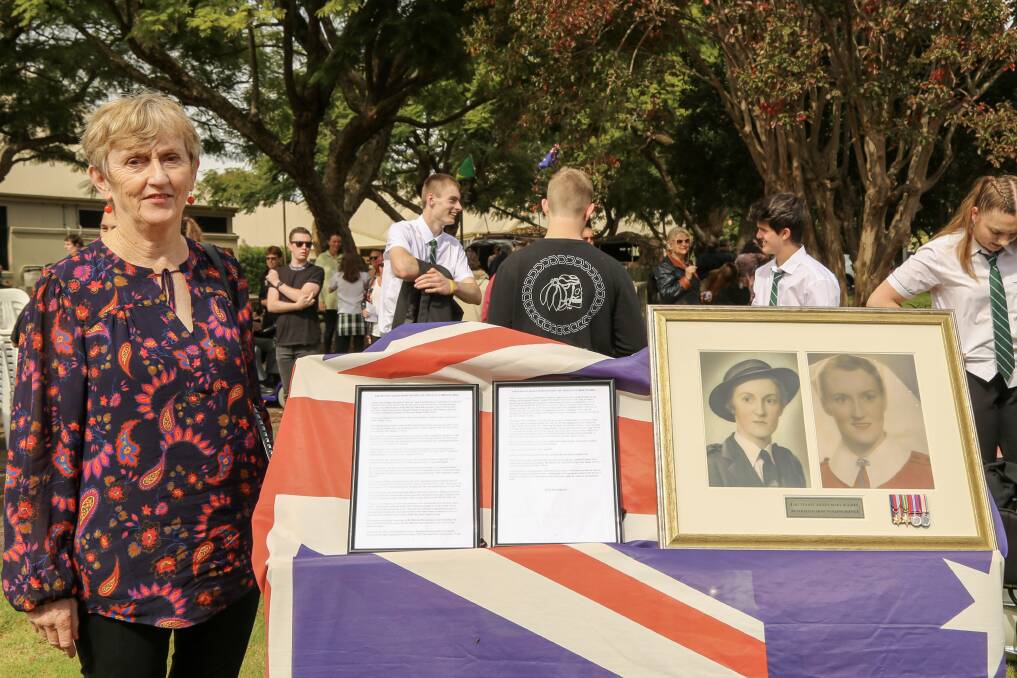 Victoria Lilley, niece of WWII nurse Lieutenant Aileen Mary Hughes, with the photo and history for her aunt at Raymond Terrace on Monday.