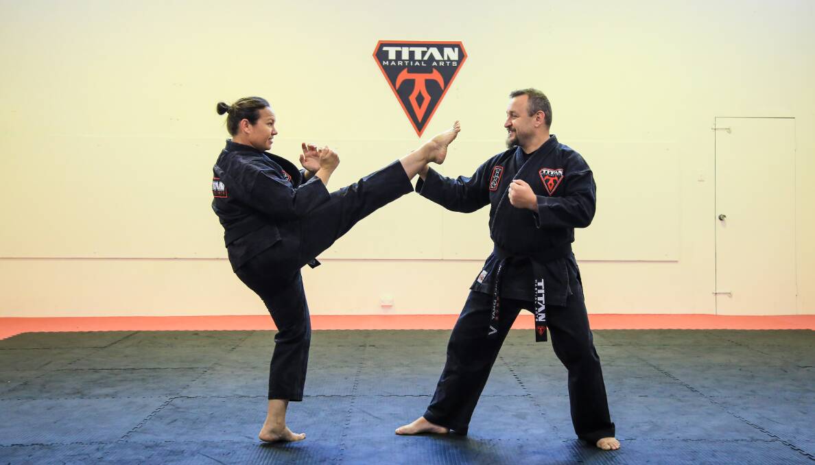 DEFENCE: Natasha and Michael Omay, instructors of Titan Marital Arts, are offering Port Stephens women the opportunity to win a scholarship through the Pink Belt Project. Picture: Ellie-Marie Watts
