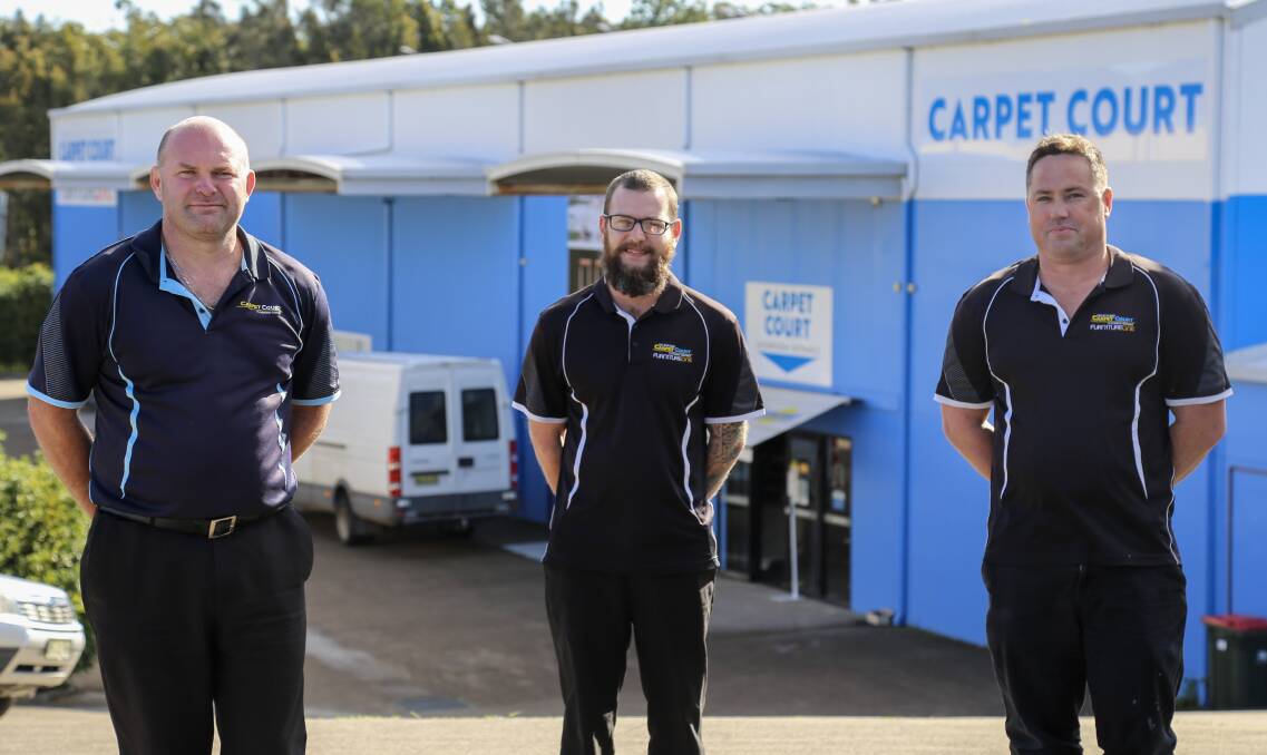 SERVICE FOCUSED: The Nelson Bay Carpet Court team of Russell Treglow, James White and Byron Gaffney. The store is located in the Shearwater estate in Taylors Beach.