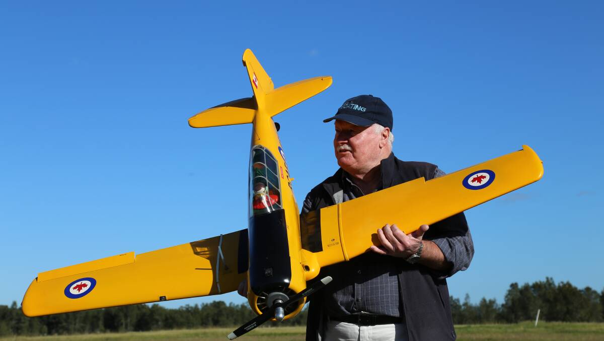 Bruce Doughton with one of his model planes. Mr Doughton said he has about 80 models. Picture: Ellie-Marie Watts