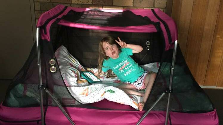 Elise Tolhurst in her portable safety sleeper bed, purchased using funds from the Marauders' charity round last year.