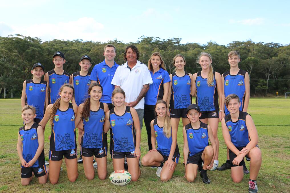 RECOGNITION: Nelson Bay Touch Association vice president Ian Doherty, president Nev Gear and coach Elissa Doherty (centre back) with the association's representative players. Picture: Ellie-Marie Watts