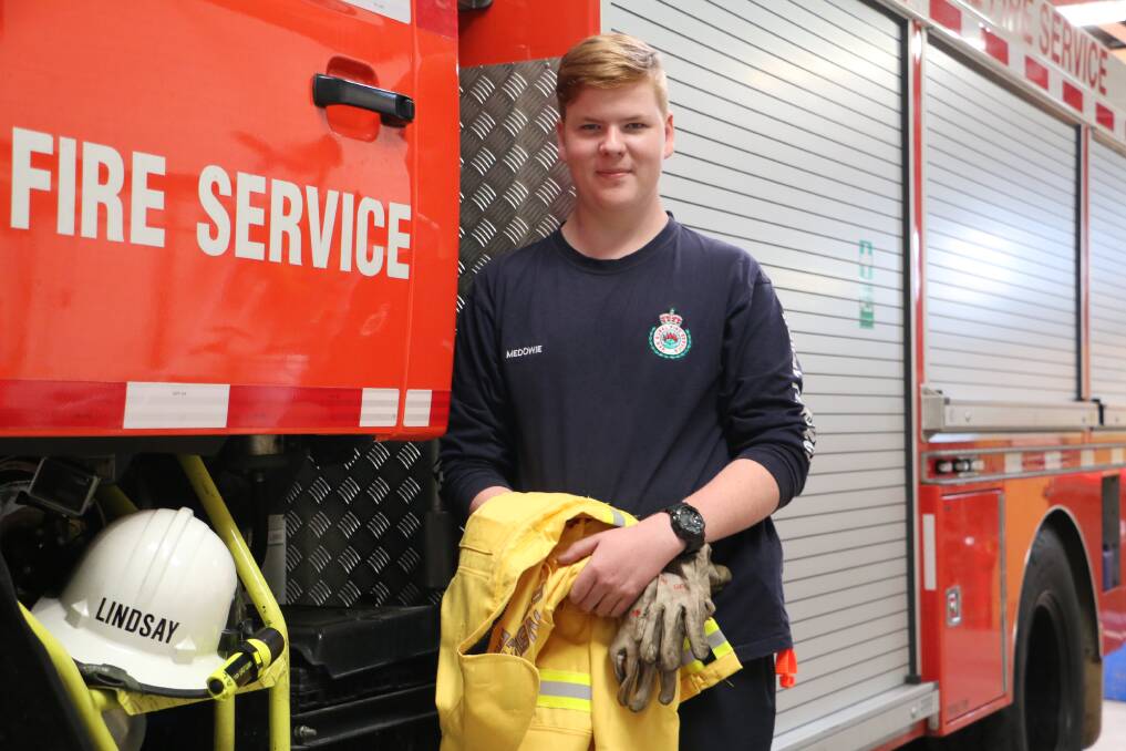 EAGER: Aaron Lindsay, 16, is Medowie Rural Fire Brigade's youngest member. He has been on the ground fighting fires in Port Stephens this month. Picture: Ellie-Marie Watts