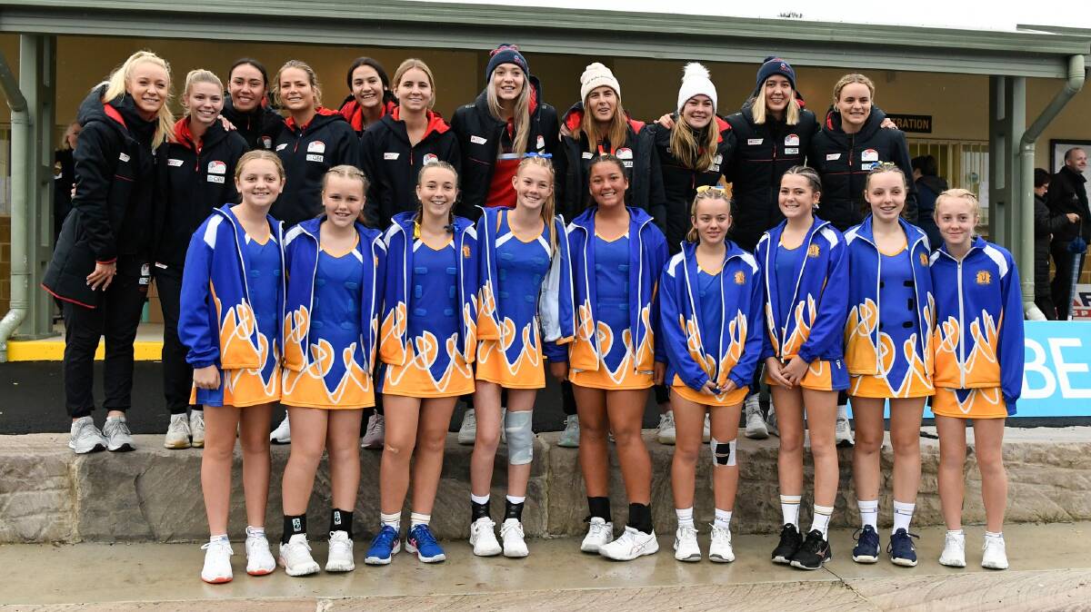 Nelson Bay Netball Association's 13 years' team with the NSW Swifts at the Junior State Titles on Saturday, July 3. Picture: Netball NSW