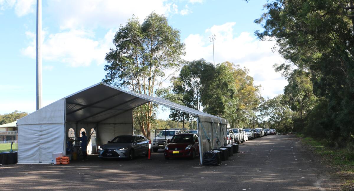 There were long queues at the Tomaree Sports Complex drive through testing clinic on Thursday after the NSW Government announced a one-week lock down for the Hunter. 