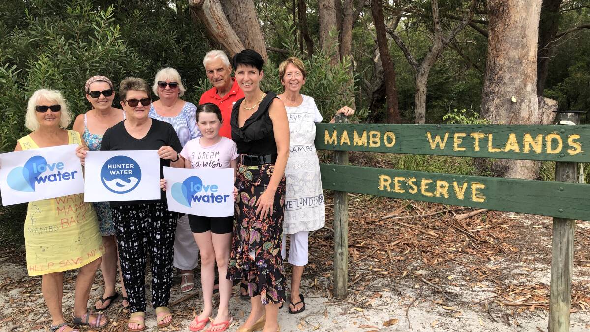 Port Stephens MP Kate Washington at the Mambo Wetlands, Salamander Bay, with residents to thank Hunter Water for its $10,000 donation made in January.