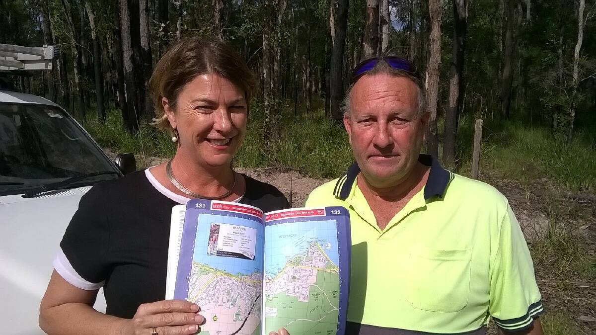 RANDOM: NSW Roads Minister Melinda Pavey with Nelson Bay builder Paul Smith at Clarence Town on Monday. Mr Smith showed Ms Pavey a map, pictured, the already earmarked Fingal Bay bypass route. Picture: Supplied