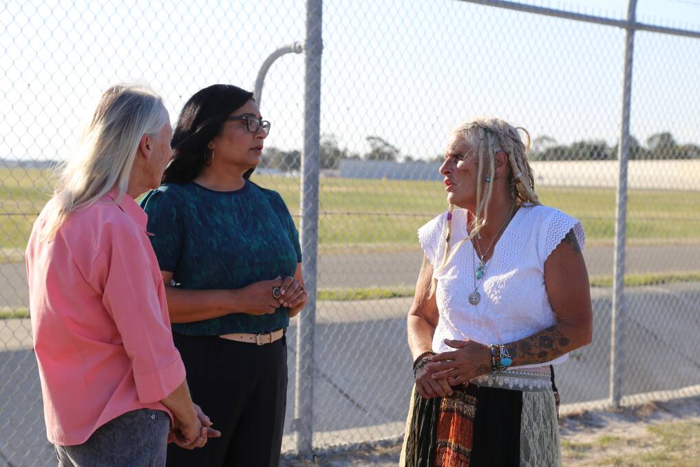 Senator Mehreen Faruqi discusses the impact of PFAS contamination with 'red zone' residents Jenny Robinson and Linden Drysdale in October 2019.
