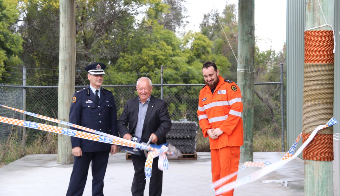 DEDICATED: Philip Hudson, Port Stephens SES Local Commander, Phil Neat, Newcastle Permanent Charitable Foundation Chair, and David Douglas, Port Stephens SES Unit Controller, at the Geoff's Training Tower ribbon cutting ceremony on July 29.