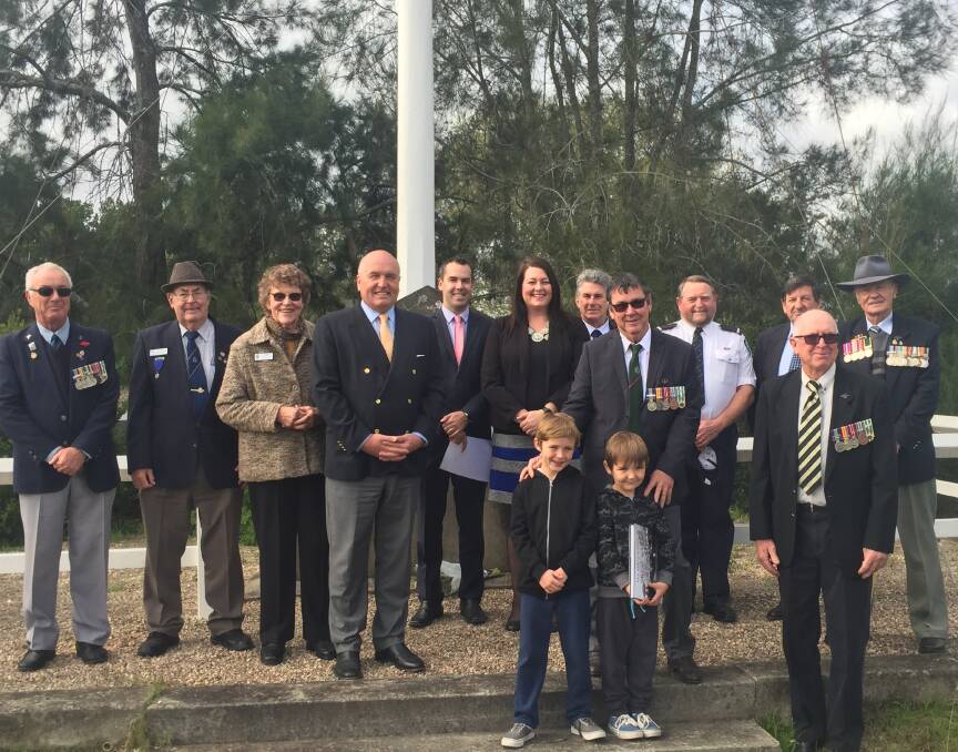 VISIT: Minister for Veterans Affairs, David Elliott, fourth from the left, at the Seaham Knitting Circle Memorial with councillors and Raymond Terrace sub-branch members.