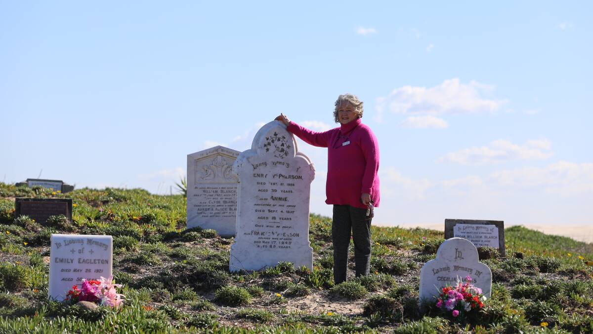 Tomaree Family History Group author Marilynne Cullen at Birubi Point cemetery, which is the focus of a new book that was approved for a council grant. Picture: Ellie-Marie Watts