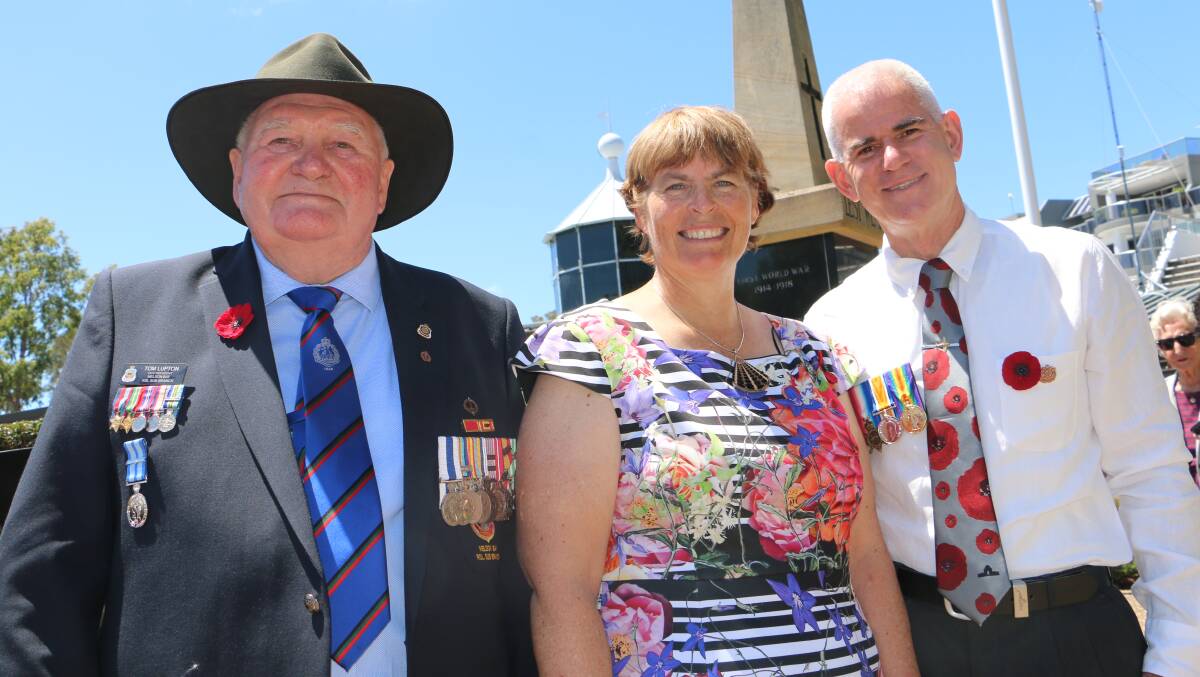Nelson Bay RSL Sub-Branch vice-president Tom Lupton with 'heroes' Tammy and WGDCR Rick Dyson at the Remembrance Day service.