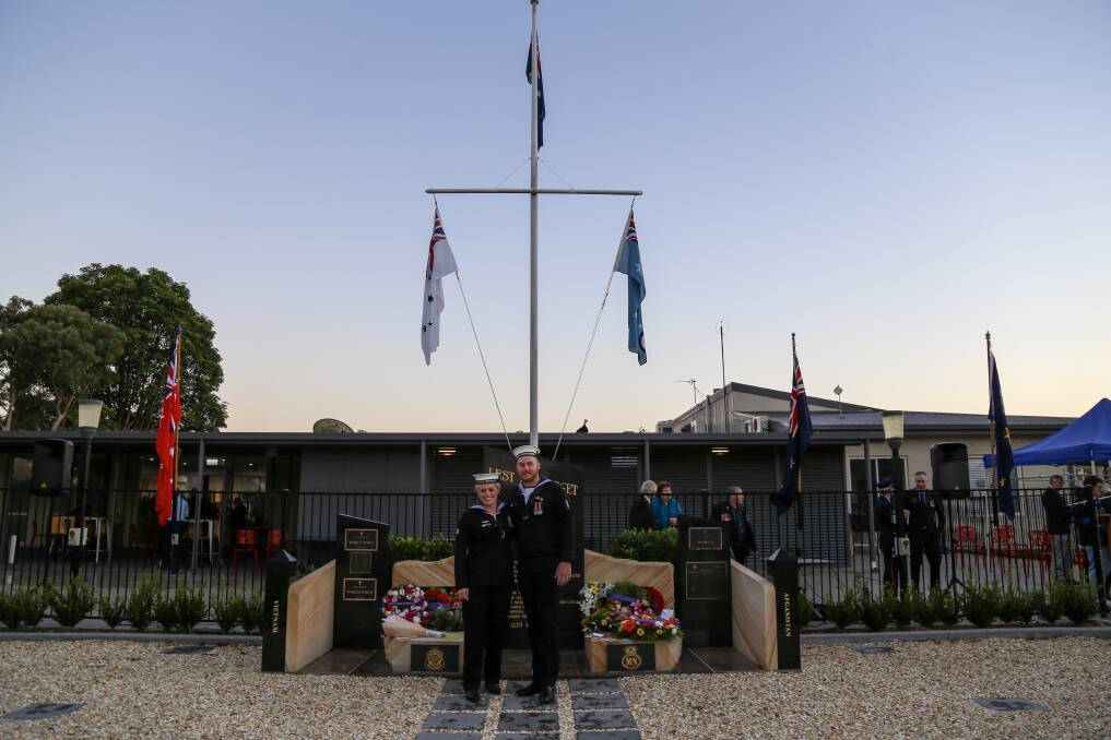 LEST WE FORGET: Able seaman Gabrielle Housego and able seaman Mitchell Parker at the Tanilba Bay dawn service. The pair are visiting Port Stephens this week but turned out to the Anzac Day service to pay their respects. Picture: Ellie-Marie Watts