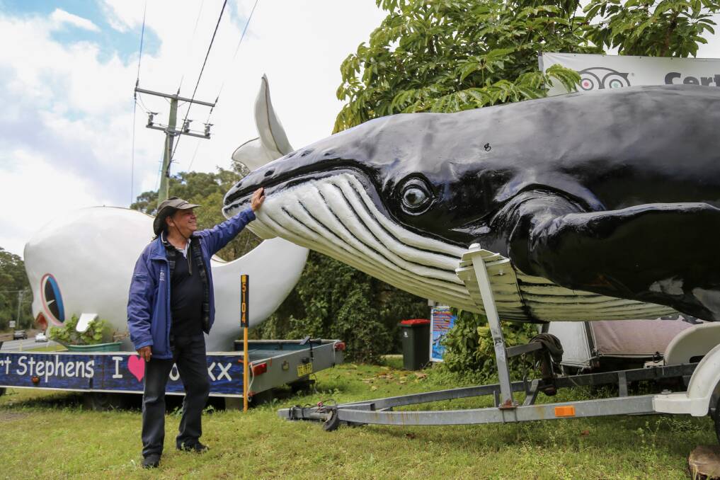 Frank Future with the Marine Parks Association fibreglass humpback whale that is in need of a name. Picture by Ellie-Marie Watts.