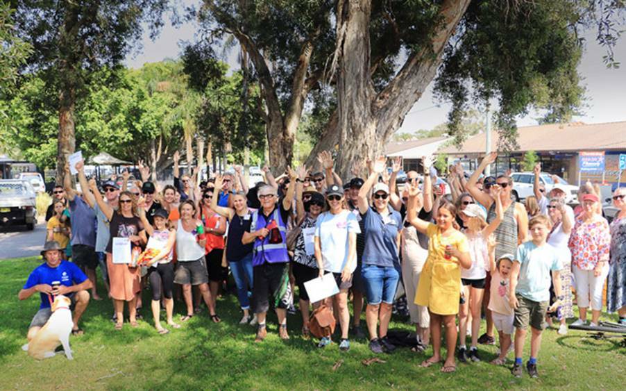 FRESH FEEL: David Engwicht (centre) with community members and volunteers celebrating the end of the Anna Bay 7 Day Makeover in December 2019. Picture: Supplied