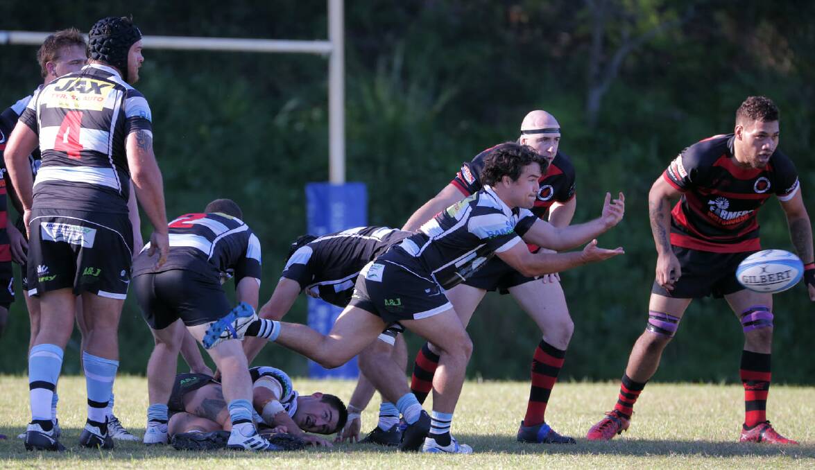 INA CTION: Nelson Bay Gropers v Singleton Bulls at Strong Oval. The Gropers and Medowie picked up a win each. Picture: Brett Wallace
