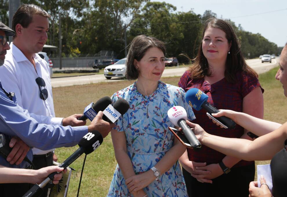 Premier Gladys Berejiklian in Salt Ash on Tuesday with Liberal candidate Jaimie Abbott. The Premier announced another $205 million towards upgrading Nelson Bay Road. Picture: Simone De Peak