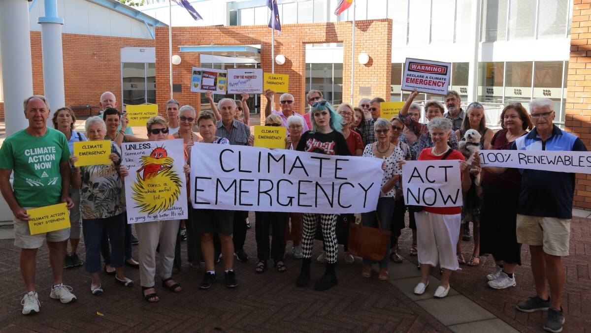 CONCERN: The climate is everyone's responsibility says Rob McCann. Protesters pictured outside Port Stephens Council's administration building in February.