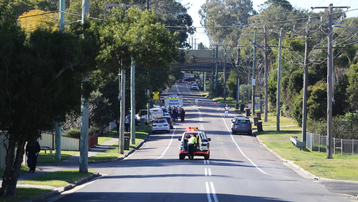 Emergency services in Mount Hall Road, Raymond Terrace on Tuesday morning where a boy, 17, was hit and killed by a bus. Picture: Ellie-Marie Watts