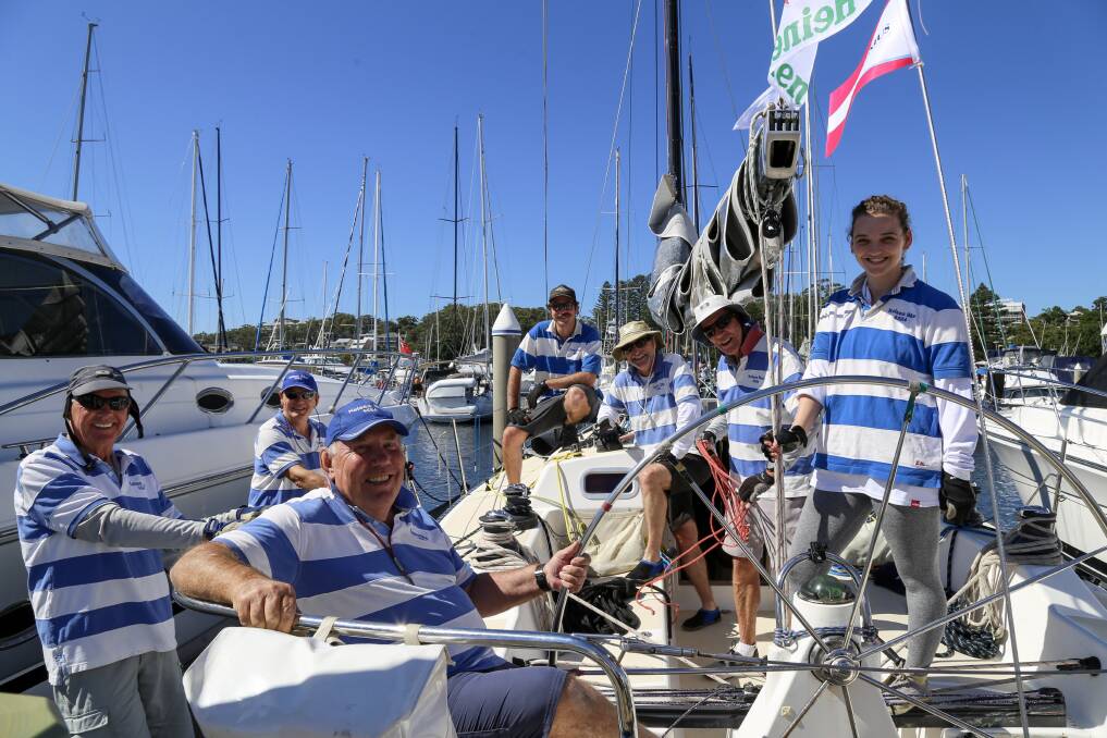 SAIL PORT STEPHENS: Skipper Adrian Williams (seated front) and his Kelsea Blue crew leaving d'Albora Marina, Nelson Bay on Monday for day one of the Commodores Cup. Picture: Ellie-Marie Watts