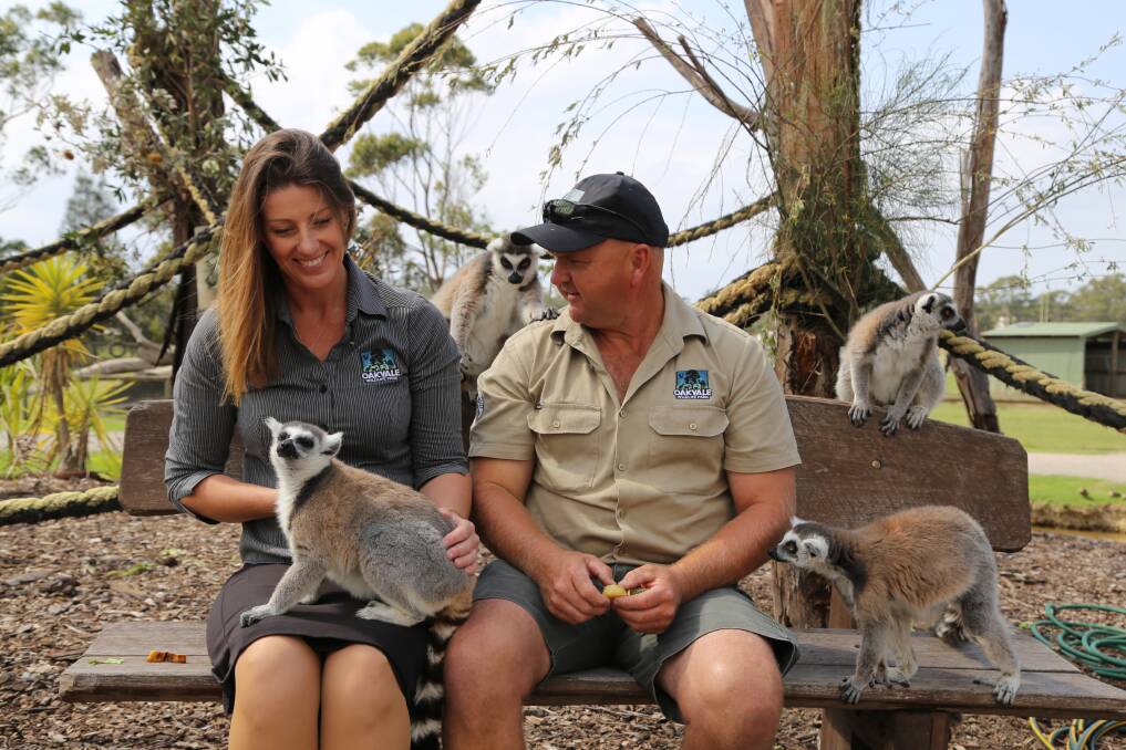 Oakvale owners Leanne and Kent Sansom feeding the wildlife park's lemurs. Picture: Ellie-Marie Watts