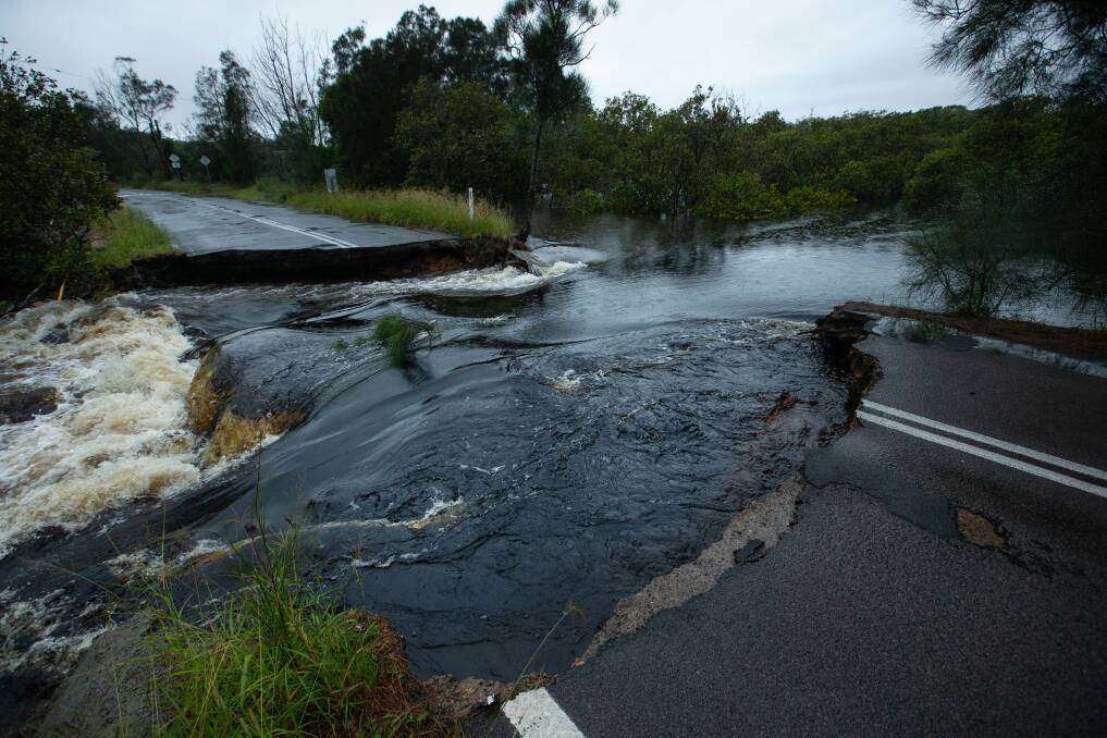 The culvert along Foreshore Drive, Corlette collapsed due to significant rain in March 2021. Picture: Newcastle Herald/Marina Neil