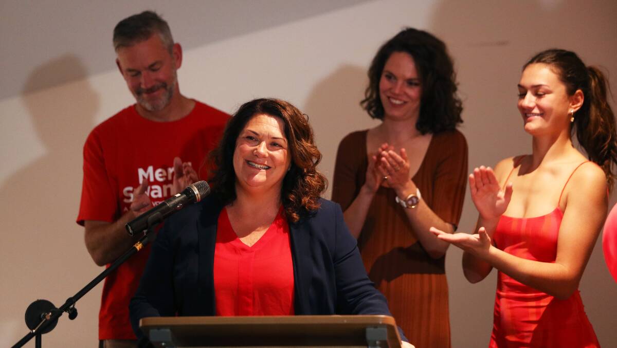 VICTORY: Meryl Swanson with husband Nick and daughters Lara and Adelaide on election night. Picture: Peter Lorimer