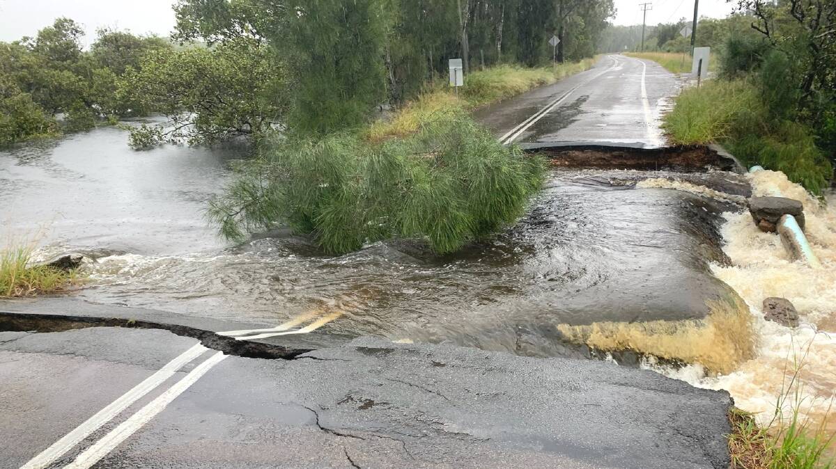 NO GO: Foreshore Drive at Corlette has been closed due to a partial collapse of the road caused by Thursday's torrential rain. Picture: Facebook/Port Stephens Council