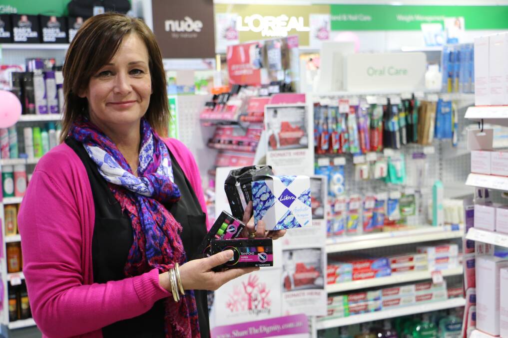 HELP: Trudy Bell, pictured in Chemmart Nelson Bay, volunteered to be a Share the Dignity "Shero" and is coordinating the organisation's sanitary product drive throughout August. Picture: Ellie-Marie Watts