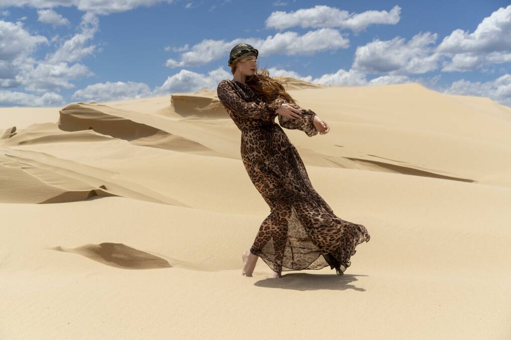 Australian singer-songwriter Vera Blue among the Stockton Sand Dunes graces the cover of Facon Magazine's Summer of Music edition, released on December 2. Pictures: Paul Dear