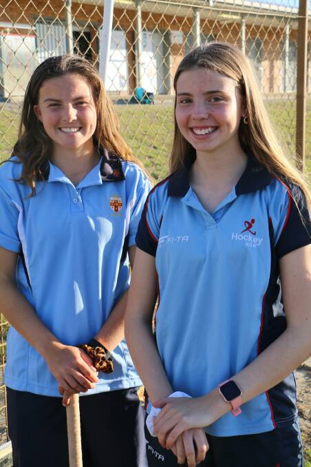 Hockey sisters Grace Baxter, 15, and Hannah Baxter, 13, at the Nelson Bay hockey fields.
