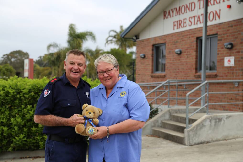 Raymond Terrace Lions donated a box of 18 trauma teddies to the fire station on September 13. Pictures: Ellie-Marie Watts