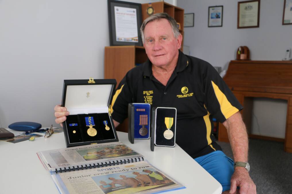 HERO: Fingal Bay's Eddy Bergsma with some of his medals achieved over 50 years as a community volunteer.