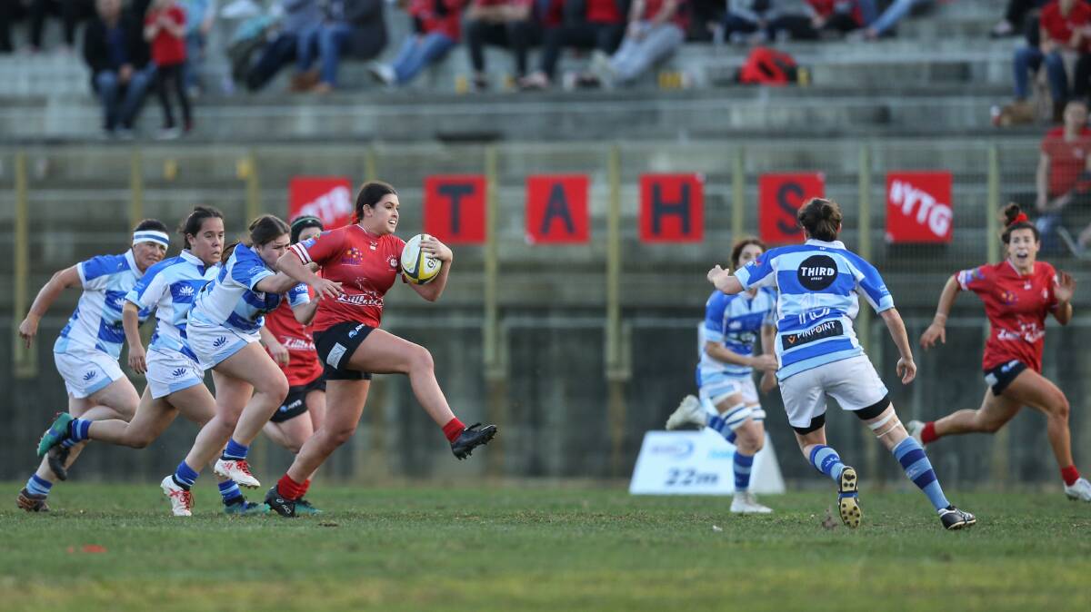 Bobbi Law, with the ball, in action for the Wanderers in the 2018 Women's rugby union grand final, which was won by the Waratahs. Picture: Marina Neil